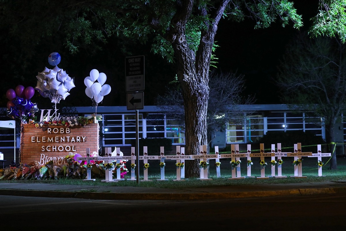 Crosses sit outside of Robb Elementary School in Uvalde, Texas, after a gunman killed 21 people inside, May 24, 2022. (Photo/JTA-Yasin Ozturk-Anadolu Agency via Getty Images)