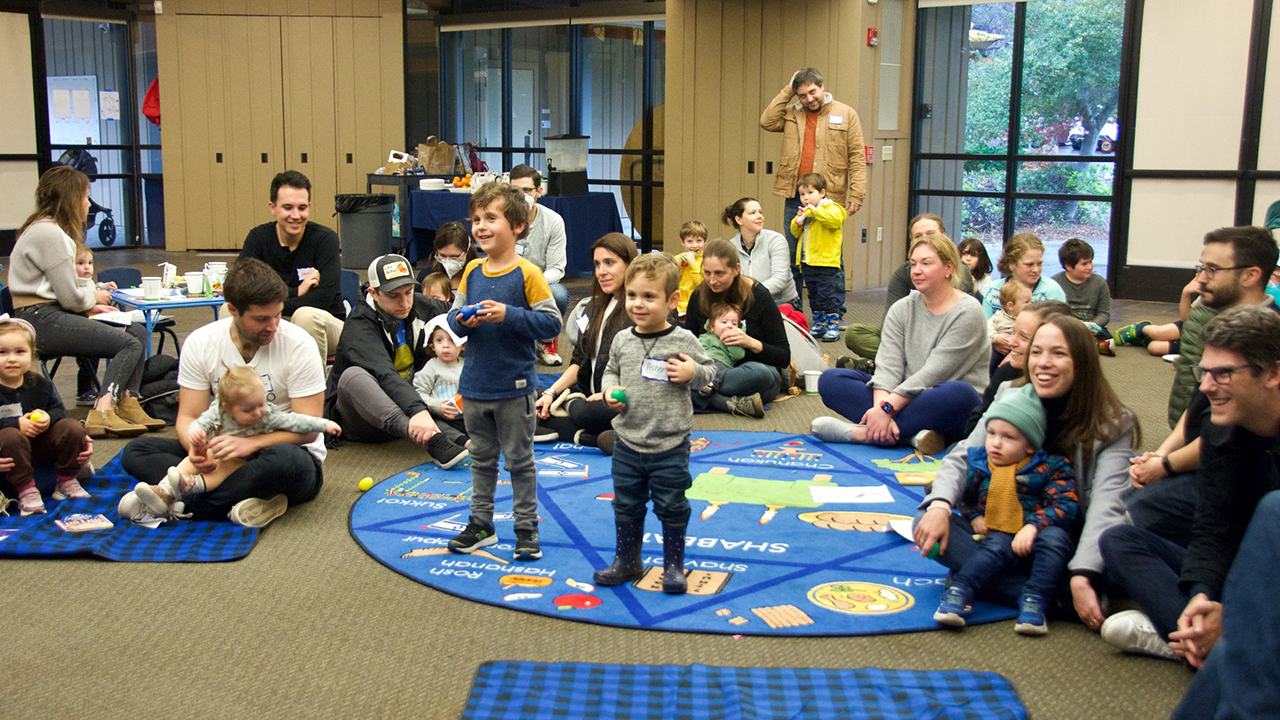 Families at a Jewish Baby Network Hanukkah party, December 2022. (Photo/JBN)