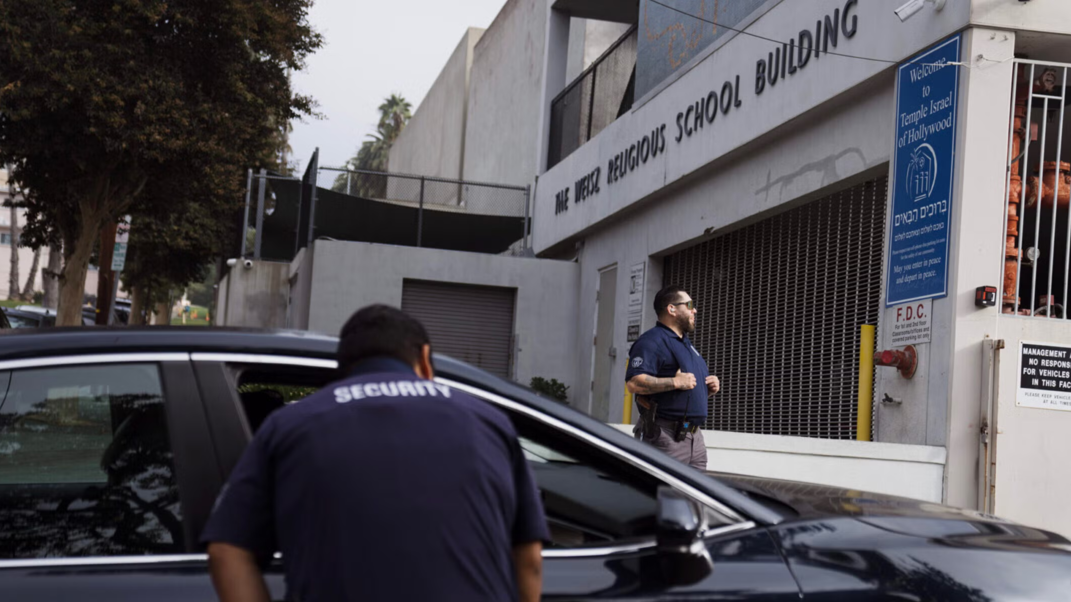 Security guards in front of a synagogue